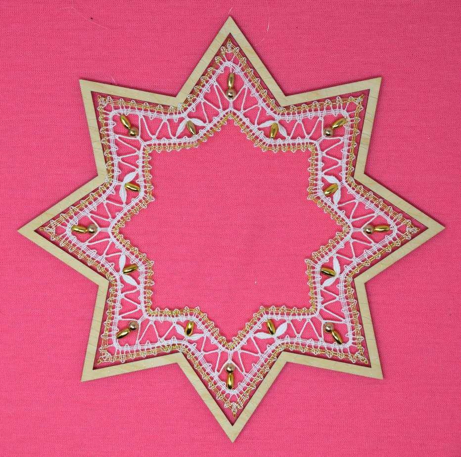 geklöppeltes weihnachtliches Fensterbild Stern